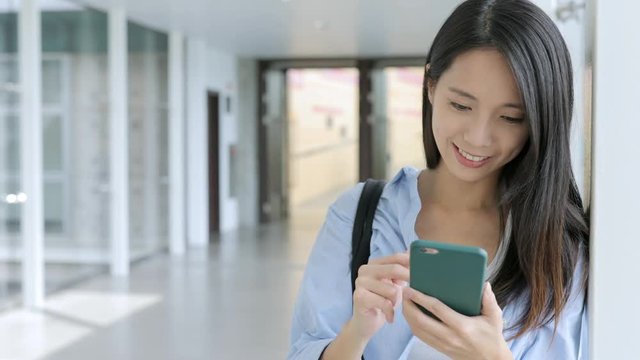 Young student use of cellphone