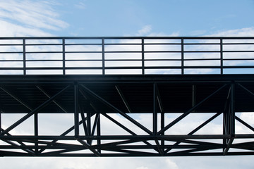 Silhouette Steel bridge structure and sky construction abstract style
