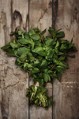 Bunch of fresh mint on wooden table. 