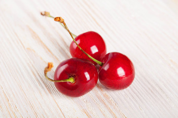 Three sweet cherries