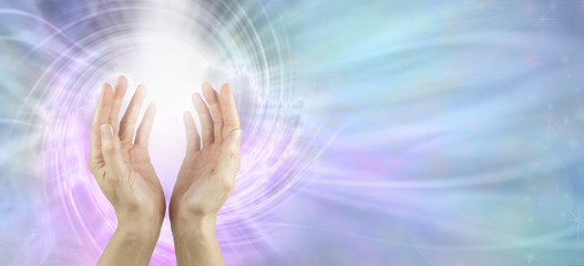 Channeling Vortex healing energy  - female hands reaching up with white vortex energy formation and...