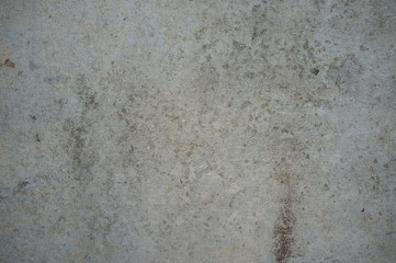 Dirt grey concrete floor