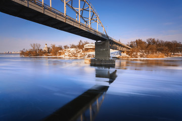 Aerial view of the great river with floating ice floes during the spring day. Drifting of ice. Ice floe. motion blur. I
