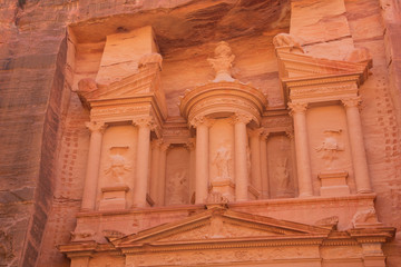 The decorative urn in detail on the upper part of the treasury of Petra