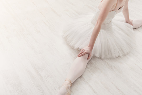 Classical Ballet dancer in split portrait, top view
