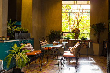 Table and steel chair in the restaurant.