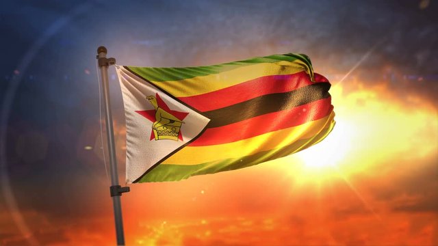 Zimbabwe Flag Backlit At Beautiful Sunrise Loop Slow Motion 4K