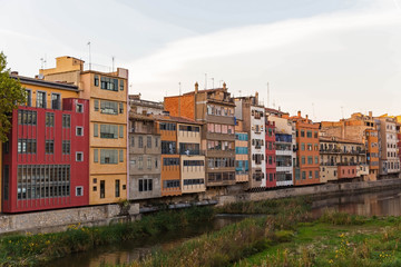 Facade of the houses on the bank of river Onyar. Girona, Catalonia, Spain.