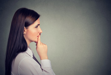 Side profile of a thoughtful young woman