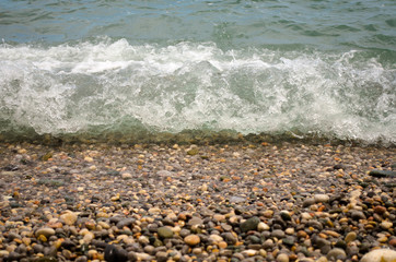 Waves on the beach in cloudy weather