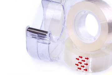 Roll of transparent adhesive tape on white background