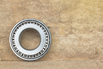 Bearings on the wood background.