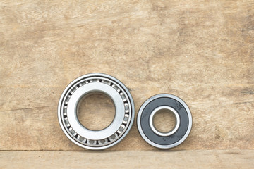 Bearings on the wood background.