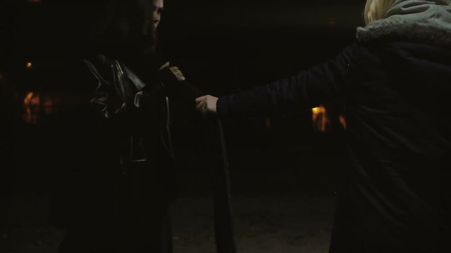 Photographer girl sexy unbutton her girl model and take it to the car