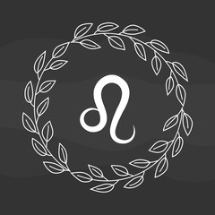 Chalk drawing flat leo symbol in rustic floral wreath