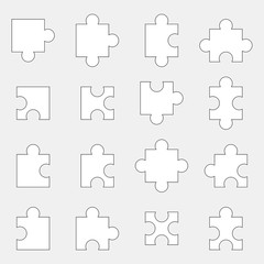 Set of white jigsaw puzzle piece on gray background