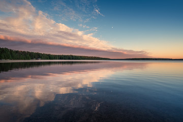 Landscape with idyllic beach at summer evening