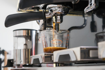 barista  making coffee by coffee   machine