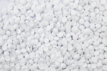 background of white industrial polymer granules