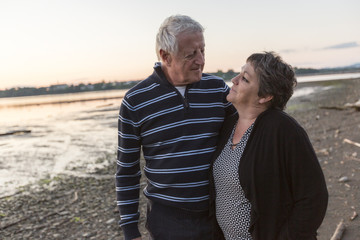 Portrait of loving senior couple at the beach