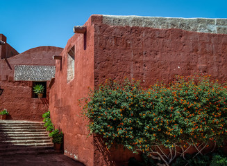 Santa Catalina Monastery with a religious quote on the wall - Arequipa, Peru
