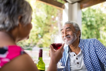 Happy couple having wine