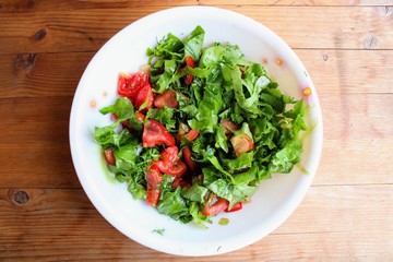 Simple but very tasty salad with tomatoes and herbs.