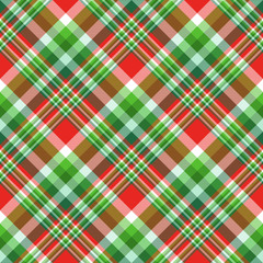 Seamless tartan plaid pattern. Checkered fabric twill texture design in stripes of bright red, dark green & kelly green, pale turquoise and white. Textile print in traditional Christmas colors.