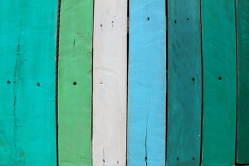 Background made up of wooden boards of different colors and textures