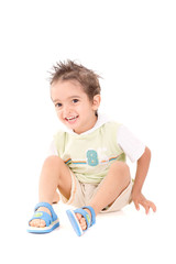 little boy posing isolated in white