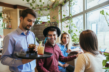Young People In A Restaurant