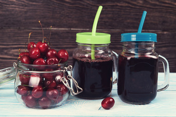 Cherry juice with glass of berries