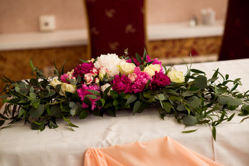 Wedding peony bouquet on table