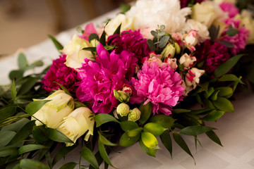 Wedding peony bouquet on table