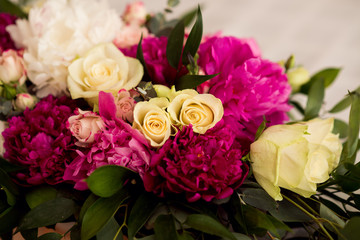 Wedding peony bouquet on table