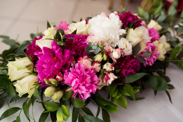 Wedding peony bouquet on table