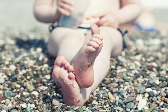 Happy little feet on the beach