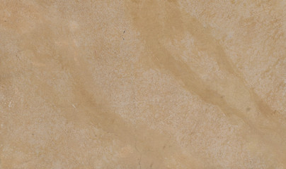 A simple, sandy coloured background with a veined effect