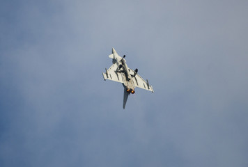 Eurofighter Typhoon with undercarriage down going vertical