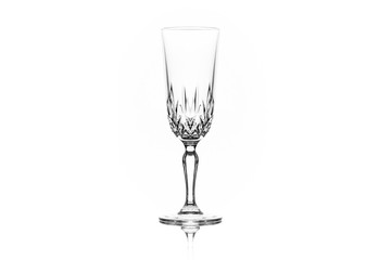 One clean empty champagne glass on white background