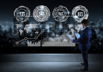 Businessman watching graph screens interface on a rooftop 3D rendering