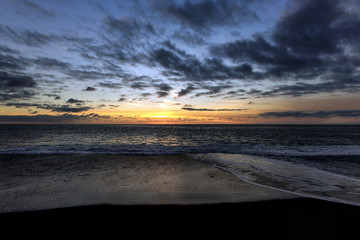 Fototapeta na wymiar Sunset at the beach of Puerto Naos (La Palma, Spain)