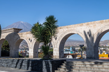 The Arches of Yanahuara Plaza and Misti Volcano on Background - written on the arches are quotes of famous people of the city - Arequipa, Peru