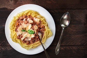 Pasta bolognese on rustic background with copyspace