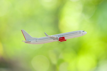Fototapeta na wymiar Airplane isolated on Green background