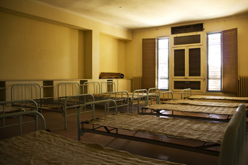 Beds in an abandoned room