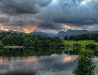Fototapeta na wymiar Sunset at Loughrigg Tarn in Lake District