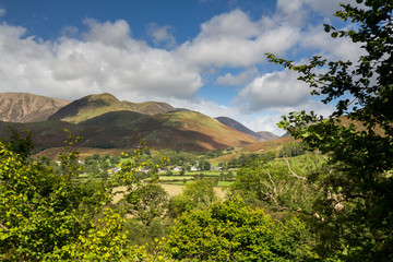 Fototapeta na wymiar View over Buttermere village to distant hills