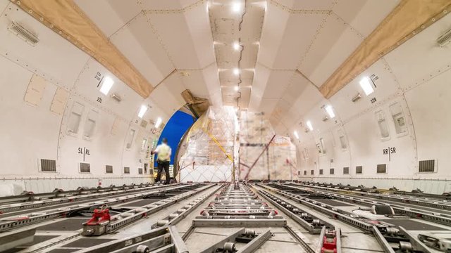 Loading air cargo freighter inside aircraft