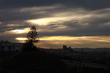 a peaceful sunset over a city landscape